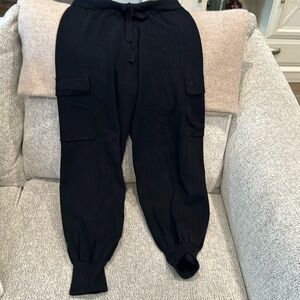 Black high waisted sweater pants with cargo pockets